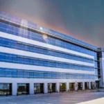aluminum cantilevered sunshades on a large building