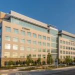 wide view of a cantilevered sunshade on a building