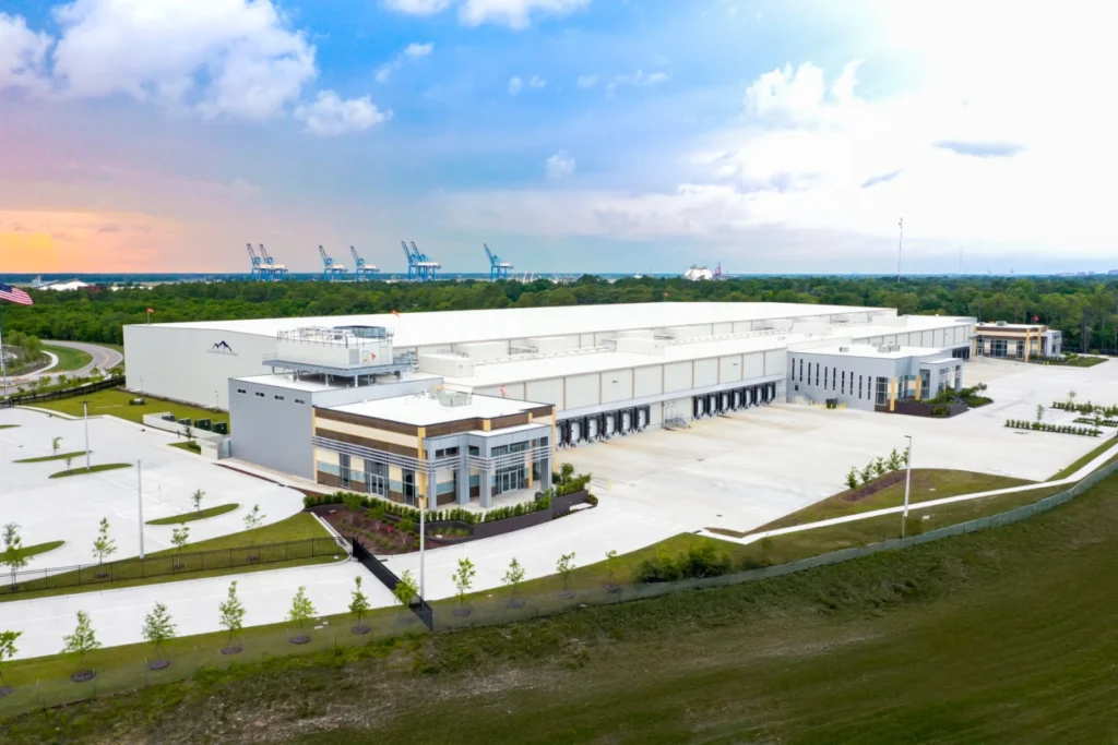 Aerial view of a large distribution center and its office front